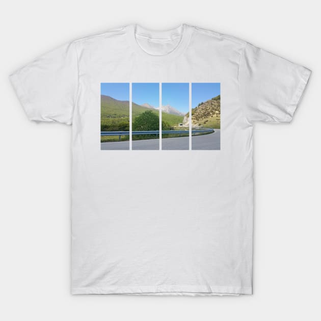 A static shot from the panoramic point Castaldia di Piancavallo; road to the tunnel inside the hill. Beautiful nature in a spring sunny day; no people around T-Shirt by fabbroni-art